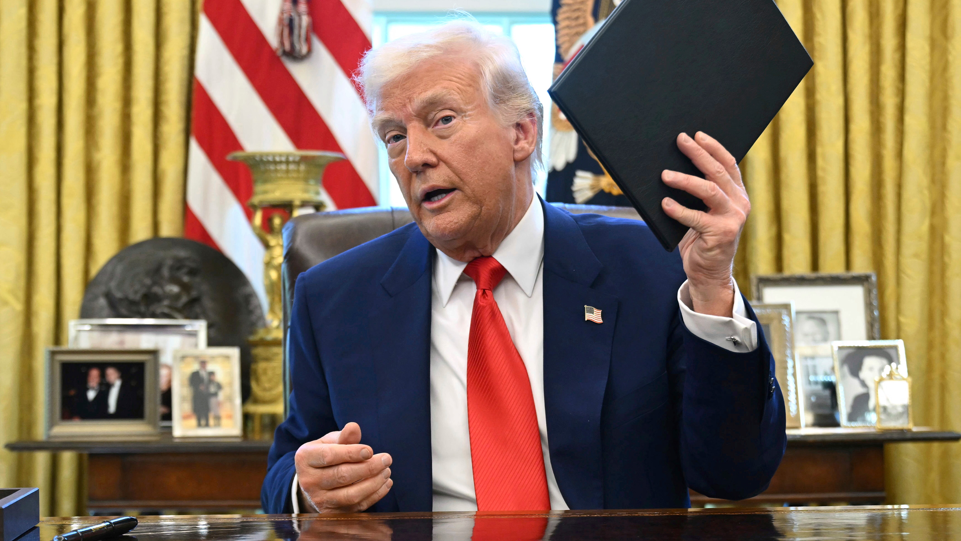 President Donald Trump speaks after signing an executive order in the Oval Office of the White House Wednesday, April 9, 2025, in Washington.