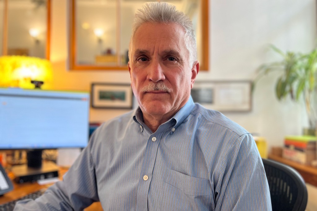 Community Board 4 member Joe Restuccia poses for a portrait.